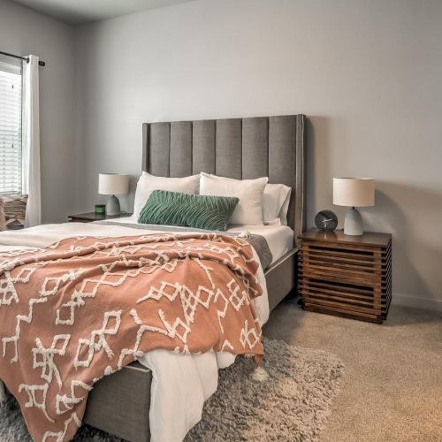 Bedroom with natural lighting and high ceilings